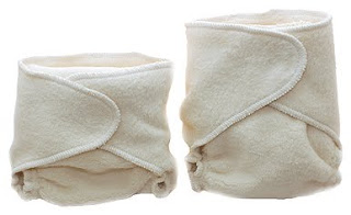 Image: Kissaluvs Contour Diapers | size comparison of folded Kissaluv hybrid diaper